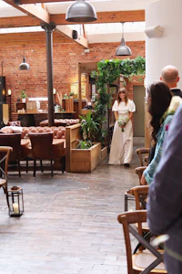a bride is walking down the aisle