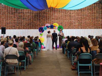 a wedding ceremony in a brick building