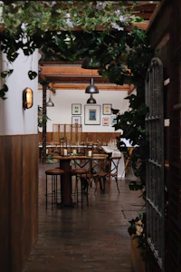a dining room with tables and chairs